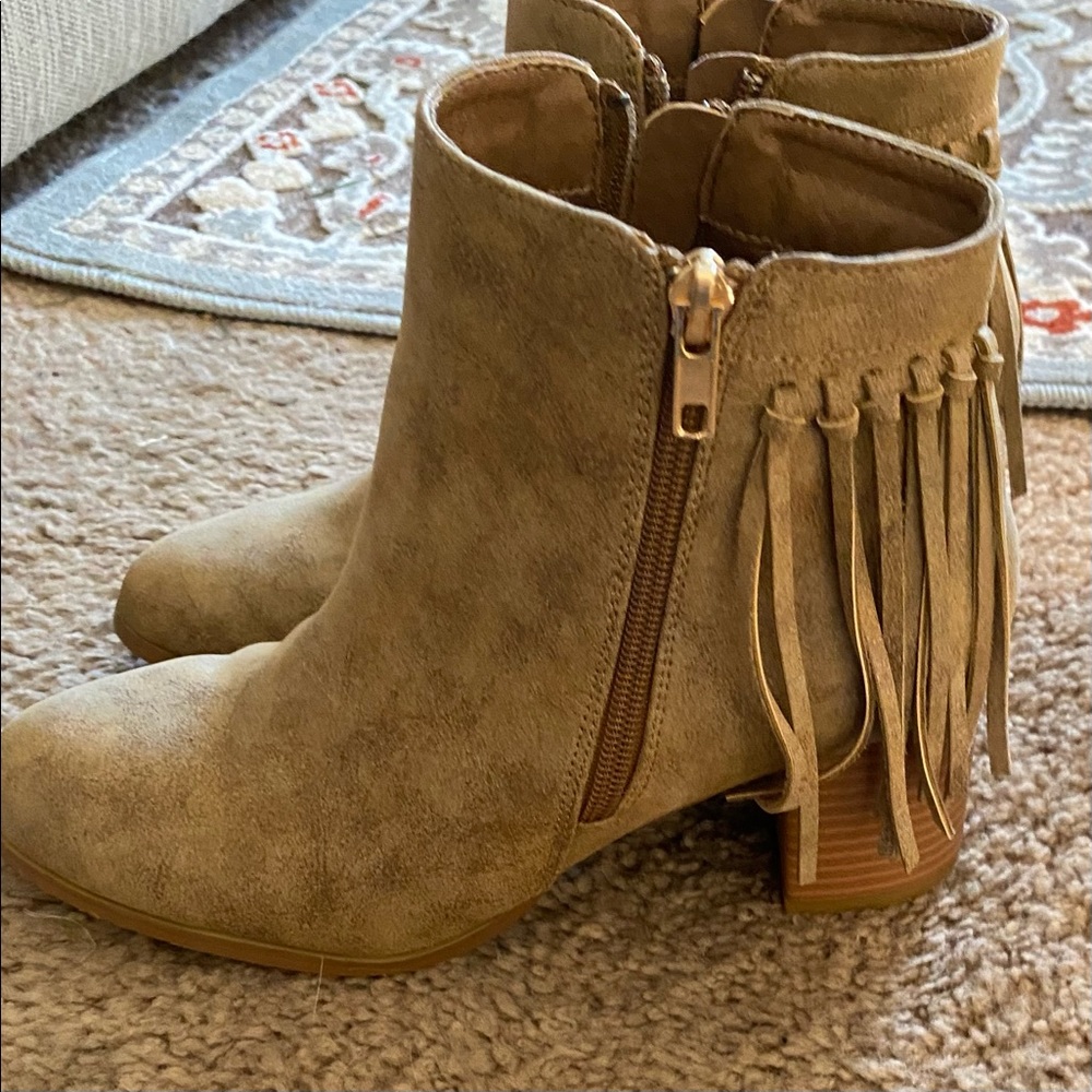 Various boots , some never worn. Sell for $20 each or $80 for all